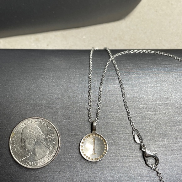Sterling silver number 1 medallion pendant.
On a complimentary 24” chain - Picture 2 of 4